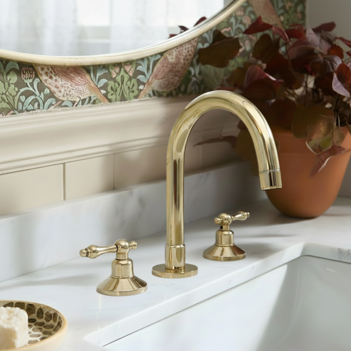 Gooseneck unlacquered brass widespread faucet, 6" reach with lever handles