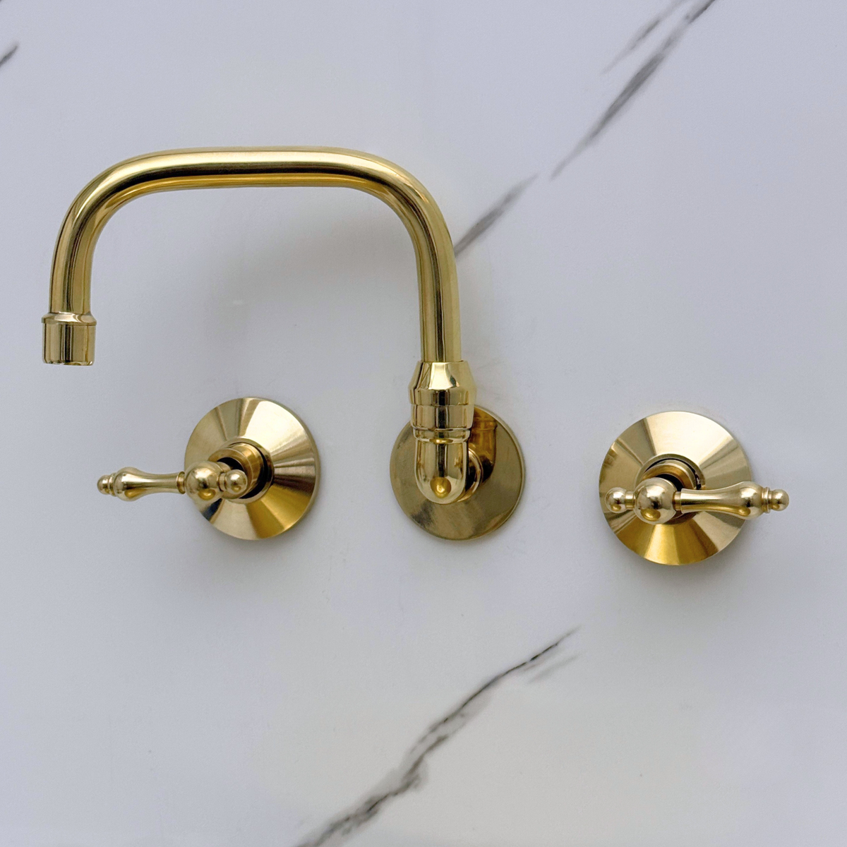 8" 360° Swivel unlacquered brass wall faucet, 8" spread with lever handles – alternate view 3