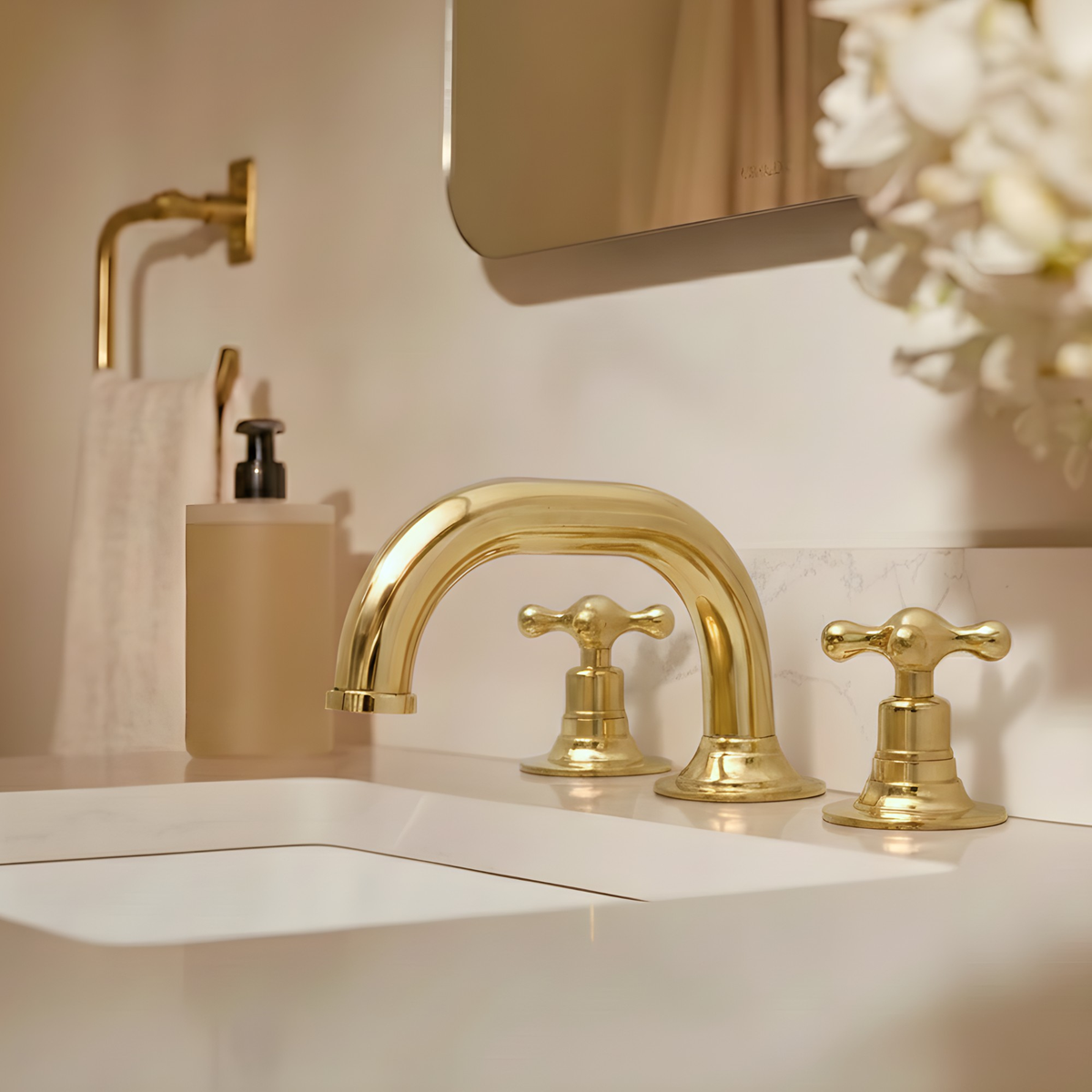 Curved unlacquered brass widespread faucet, 6.5" reach with cross handles